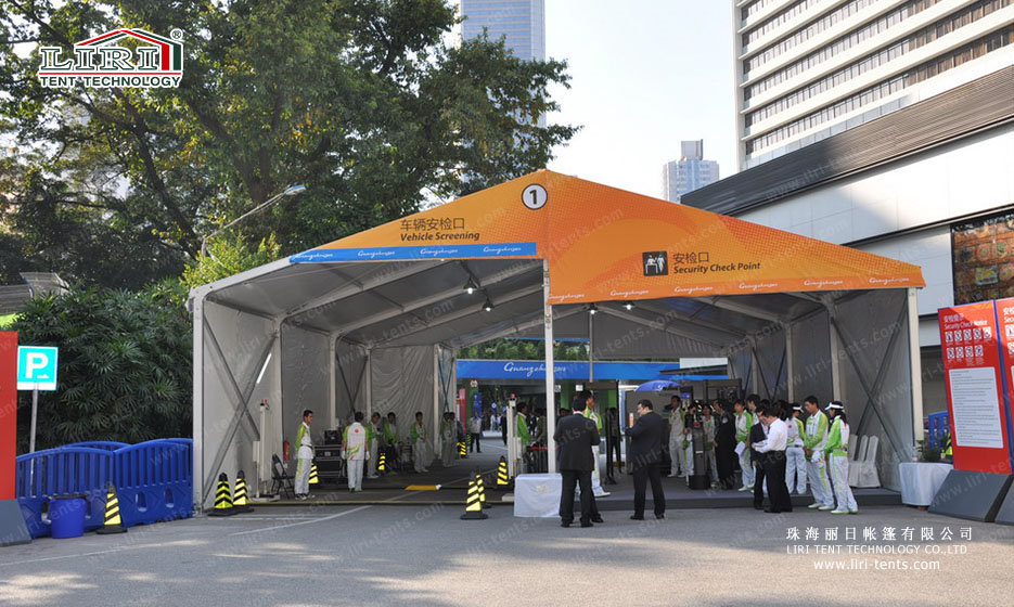 vehicle screening check by security tent