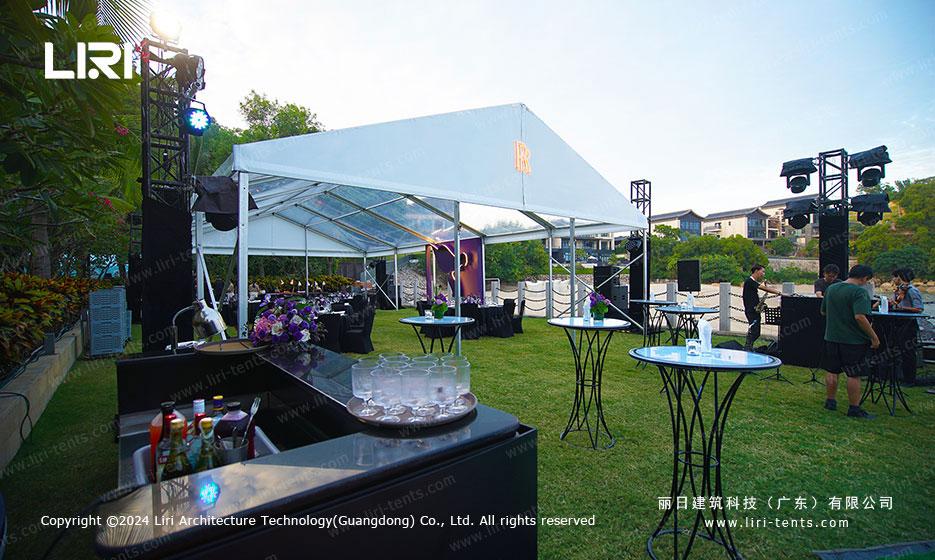 Transparent PVC party tent glowing under event lighting creating a dreamy and luxurious atmosphere